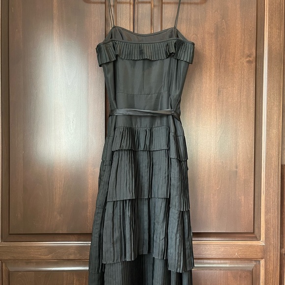 Pleated black party dress with satin bow belt - Picture 1 of 5